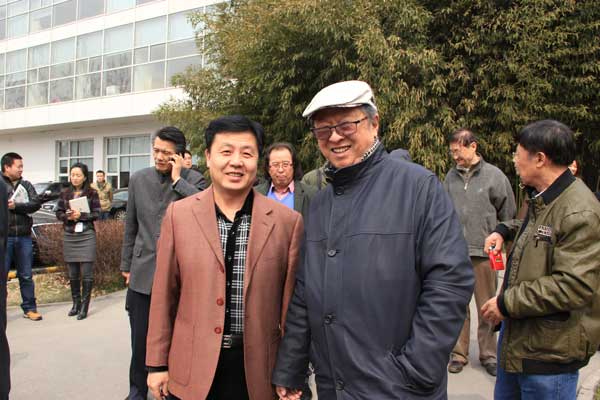 《艺术天成》总编杨焦点与中国画学会副会长李宝林合影