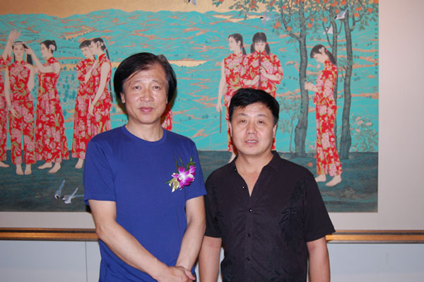 著名画家周尊圣与总编辑杨焦点合影