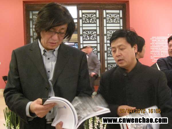 《艺术天成》总编杨焦点与中国美术家协会理事马书林合影 《艺术天成》总编杨焦点与中国美术家协会理事马书林合影